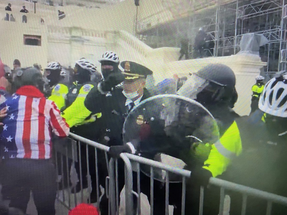 SergeantAqGo's tweet photo. Here are trump’s supporters attacking me to in a show of “we back the blue”. A direct hit to my head, getting trampled in the tunnel, holding the police line, and demanding my colleagues. I did the best I could…they just kept coming. https://t.co/To3ASXwMzL