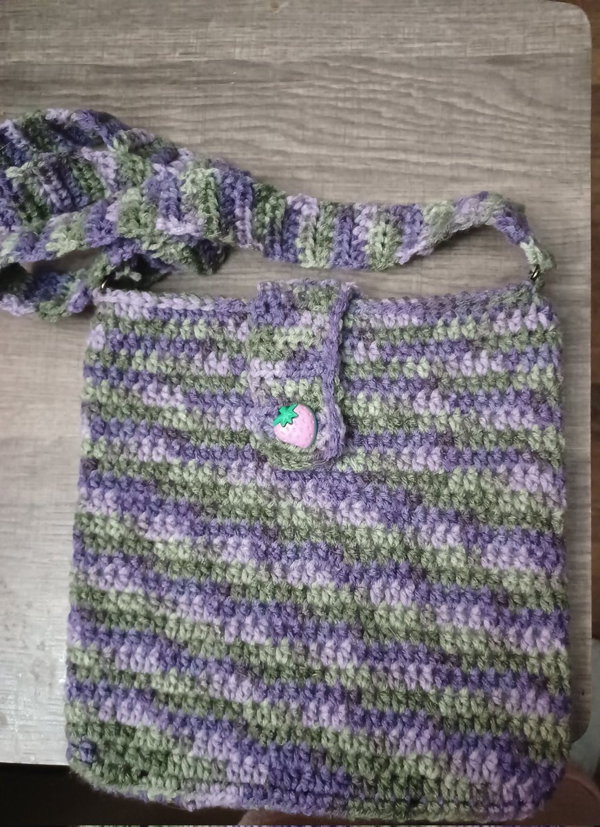 Handmade crochet bag. Super cute. Reminds me of Strawberry Shortcake. #crochet #handmade #crochetbag #yarn #strawberryshortcake #lovecrochet #crafts #etsyhandmade #etsysellers