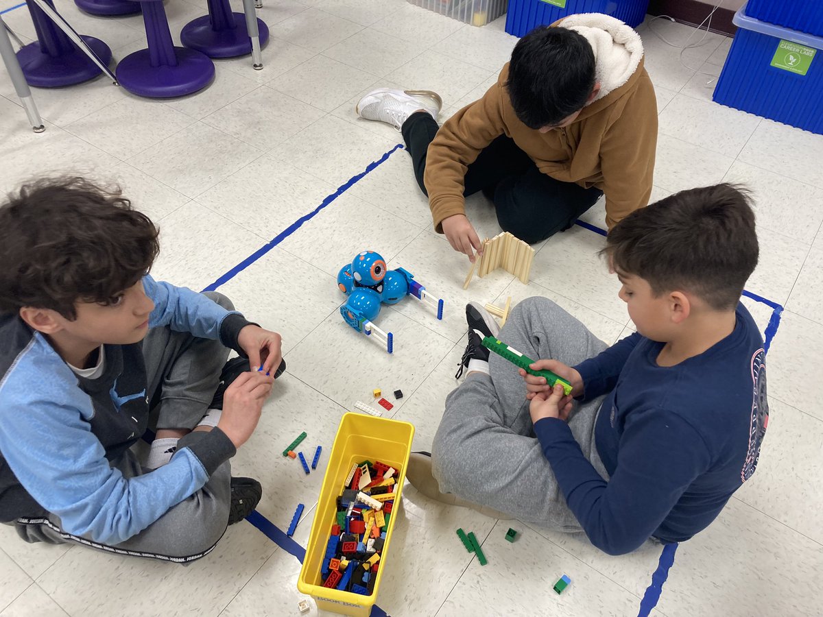 GracefulSTEM's tweet photo. Raba Rattlers combined teamwork, Legos, engineering and robotics to convert our Dash robots into bulldozers. We had some imaginative designs! Then they built structures with @KEVAplanks and coded Dash to knock them down. #RabaSTEM @NISDSTEMLabs @WonderWorkshop @LEGO_Group https://t.co/RpLu59e646
