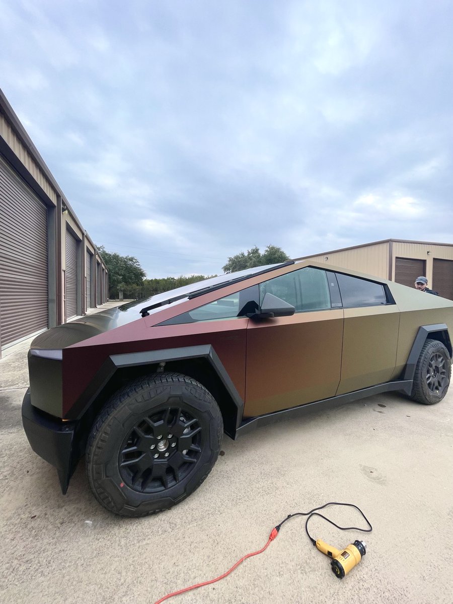 diywrapclub's tweet photo. Love looking at this #cybertruck in all the different angles 📐 Wrapped in 3M satin flip volcanic flare 🌋 https://t.co/hDyuAd6I5p