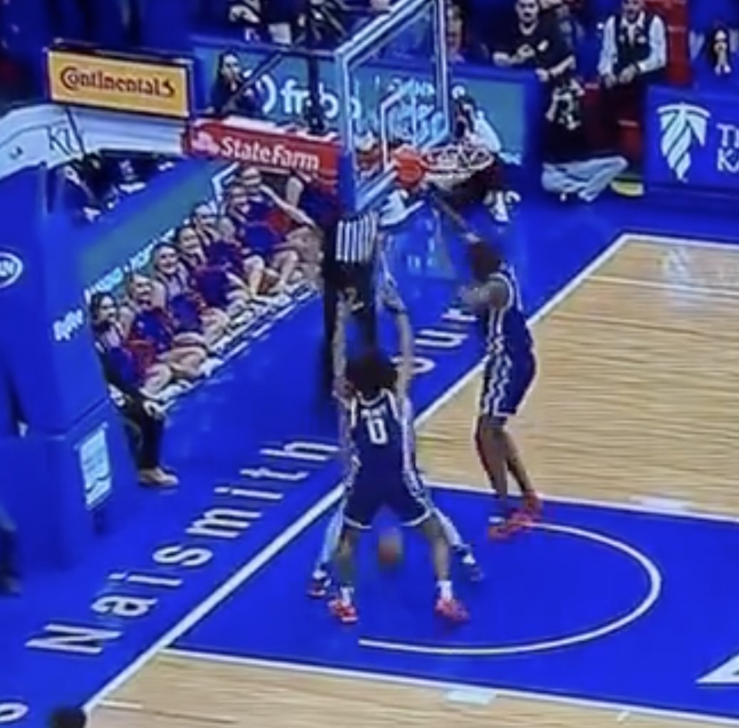 SethDavisHoops's tweet photo. For those saying Dickinson traveled on the last bucket....you see the ball there on the floor. He dribbled, which means it wasn't a travel. Little bit of a push off before the pass tho. https://t.co/9iqX8xn9rk