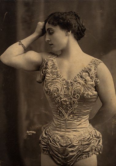 Portrait of an unidentified strongwoman from a circus. Photographed in 1905.