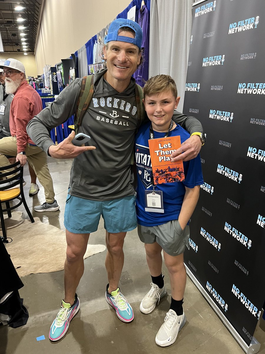 EricBartel's tweet photo. Took Sean Ryan to @ABCA1945 today. 1st for both of us. He said “It was cool!” Got to meet @ClintHurdle13 & hit @HitTraxOfficial with @letsbataround. Snag pic w Eric Byrnes #LetThemPlay & met our @PGYouthBB uniform reps. S/O to @RobVB73 & Will for helping #TexasThrowdown look good https://t.co/VNkxdhEnKU