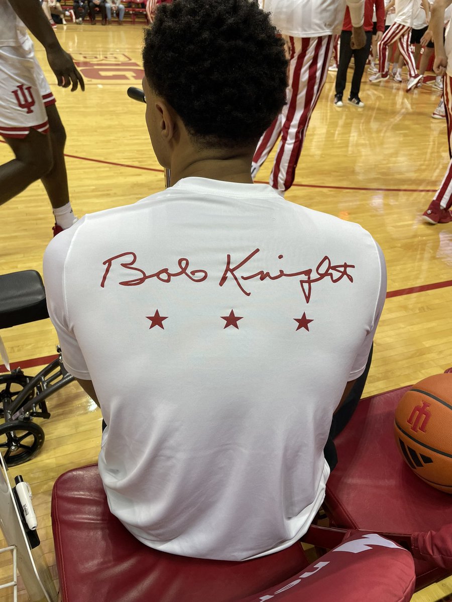 For tonight’s game, the Indiana staff is wearing the red pullovers with the RMK patch on them, and the players are wearing warmup shirts with “Bob Knight” and three stars for the three national titles Knight won at IU. #iubb