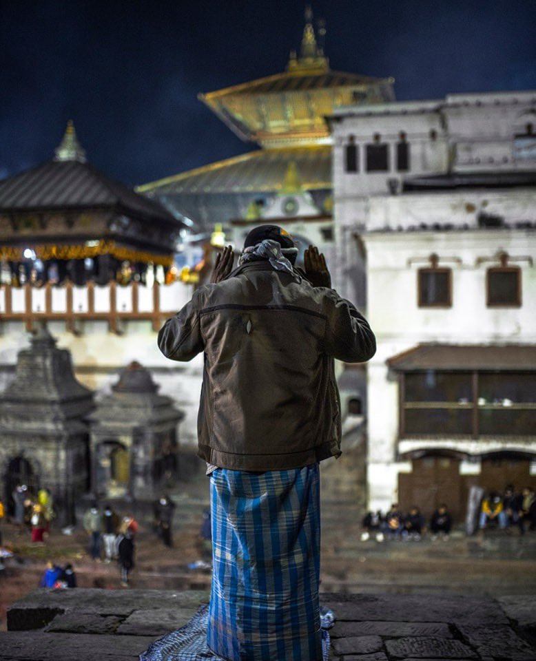 हाम्रो नेपालमा: A person from Muslim community reading Namaz at Pashupatinath temple. ❤️ Pic. @photokihchuwa