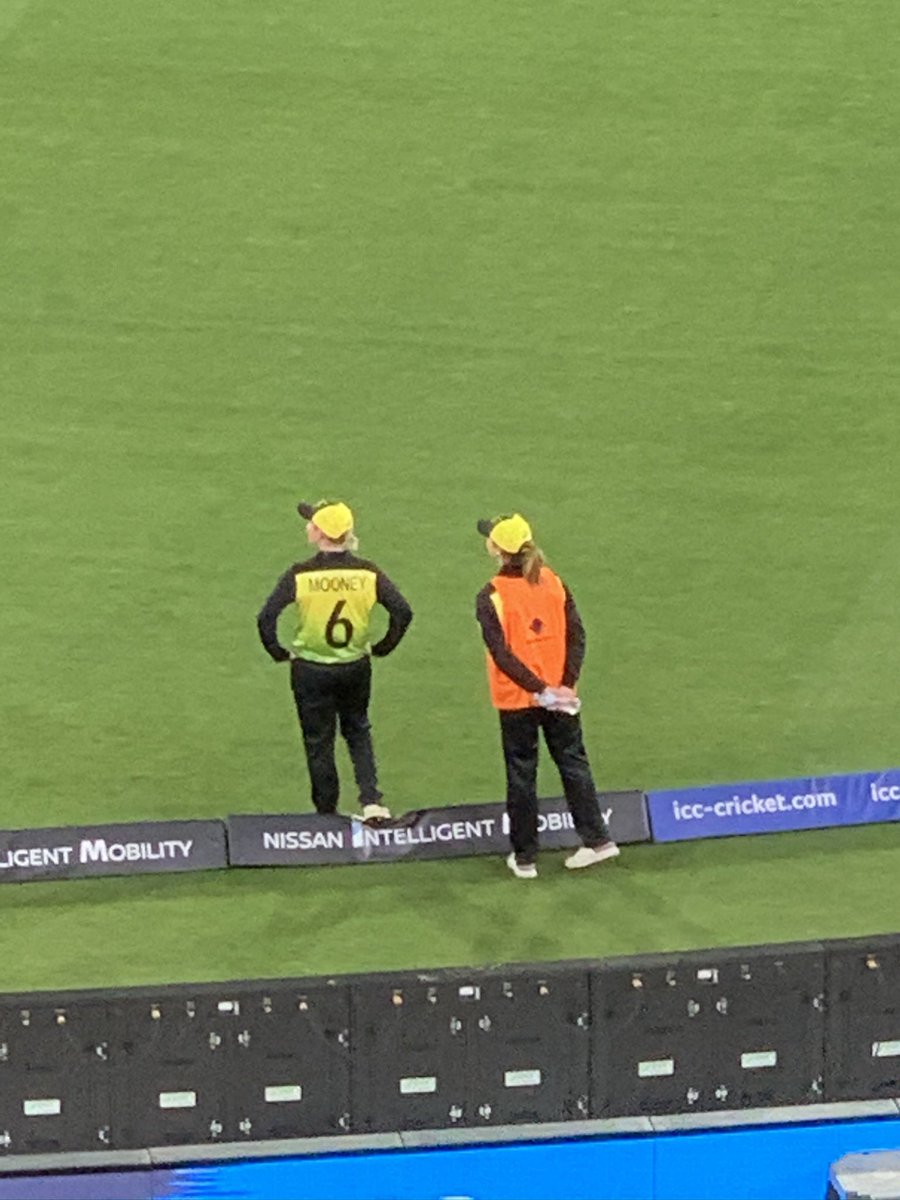 Listening to <a href="/JollyLauz18/">Laura Jolly</a> <a href="/cricketcomau/">cricket.com.au</a> Scoop pod. Here’s my favourite Pez moment. Last few overs of the T20CWC Final in Melbourne. A boundary chat and cuddle with Moons. <a href="/EllysePerry/">Ellyse Perry</a> is the <a href="/AusWomenCricket/">Australian Women's Cricket Team 🏏</a> talisman, even carrying the drinks.