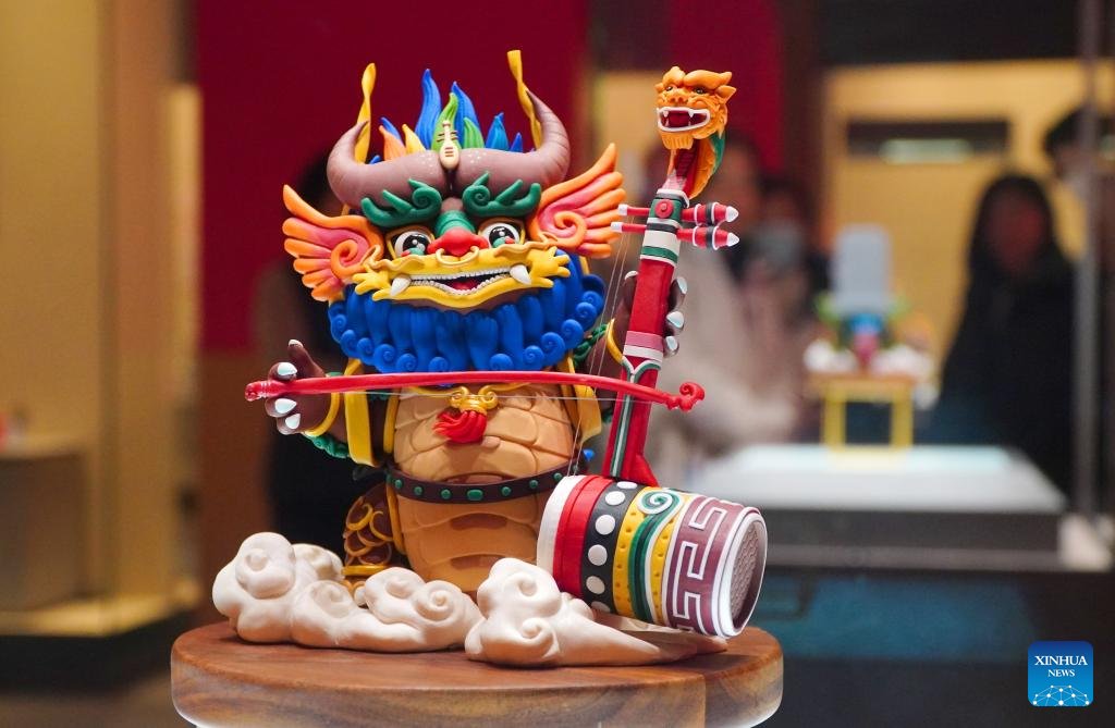 PDChina's tweet photo. Creatively designed polymer clay figurines featuring Chinese dragons are on display at a porcelain and glaze museum in Zibo City, east China's Shandong Province. Over 300 #PolymeClay artworks are showcased during this exhibition themed on the Chinese zodiac #YearOfTheDragon. https://t.co/RFb3tGNsBE