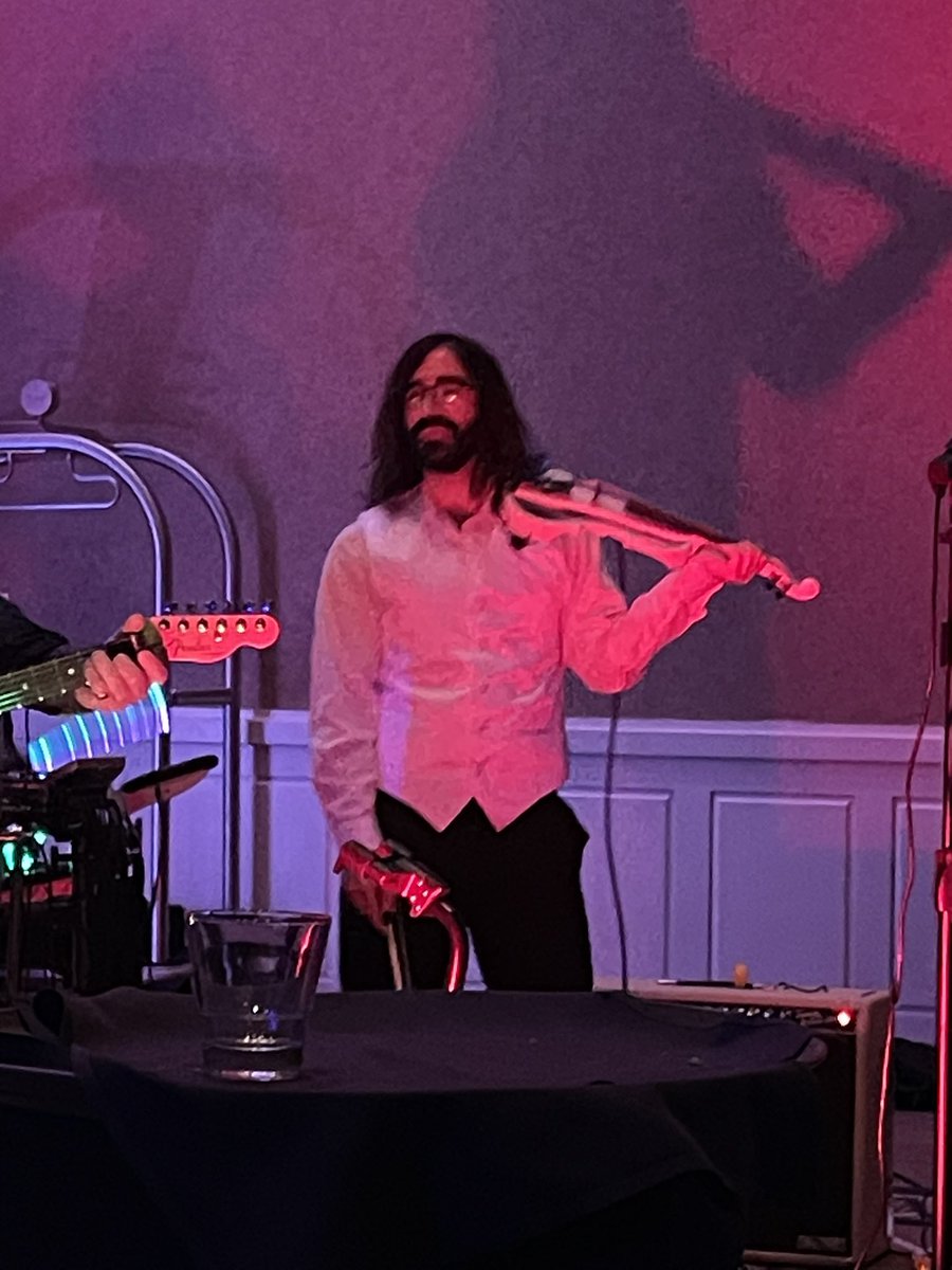 JTotz's tweet photo. Didn’t expect to see @MoistCr1TiKaL rocking the electric violin at this wedding I’m at. https://t.co/sXPwb4PTg6