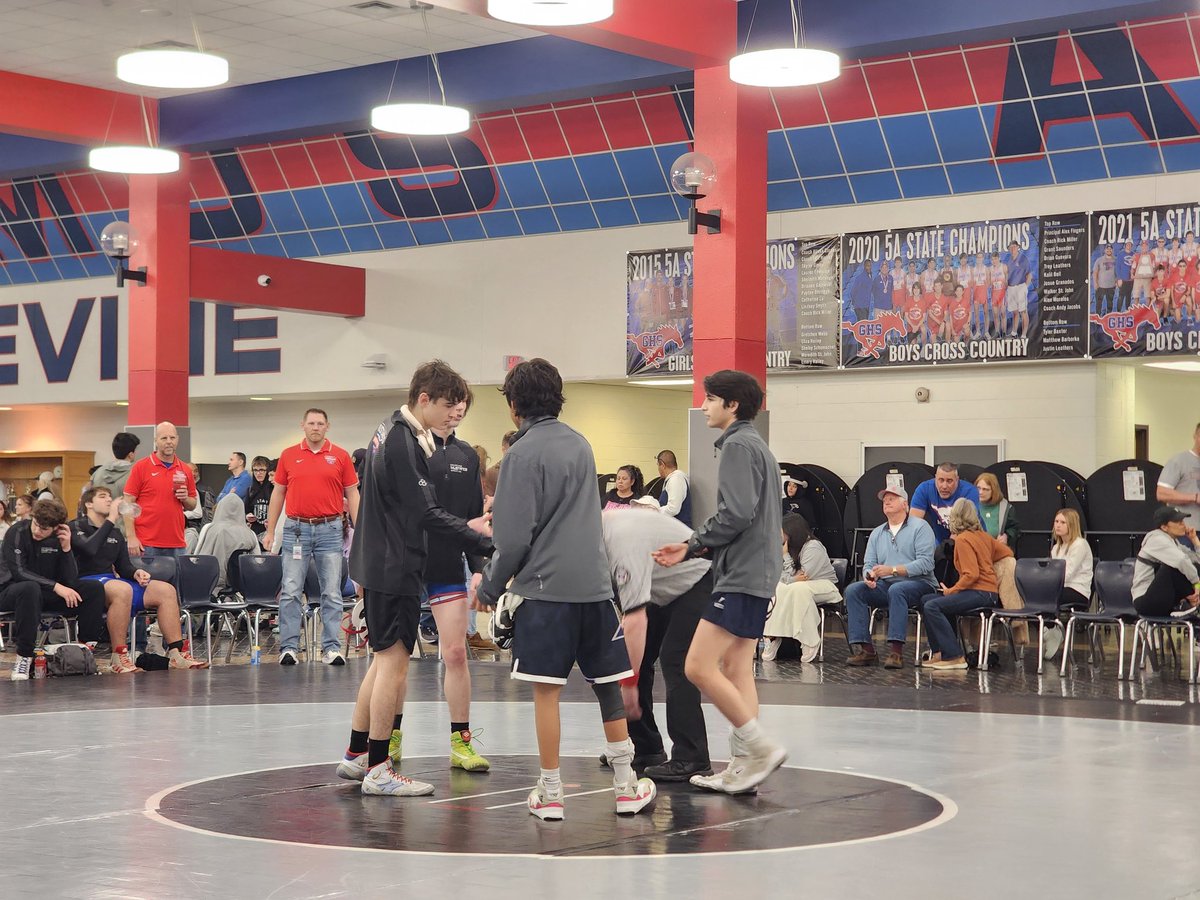 Captains Jonas Casillas and Mateo Barron shake hands with Grapevine