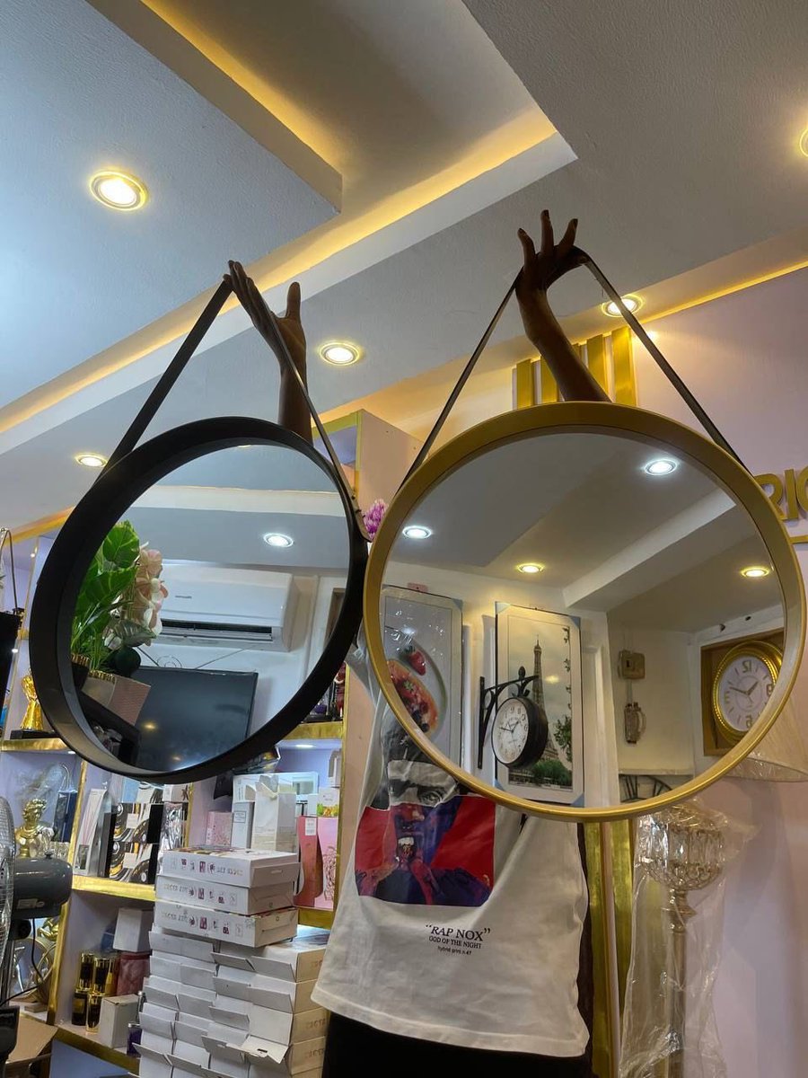 Round belt mirror   

Available in black and gold 

Size: 50cm  

Price: 60,000 Naira