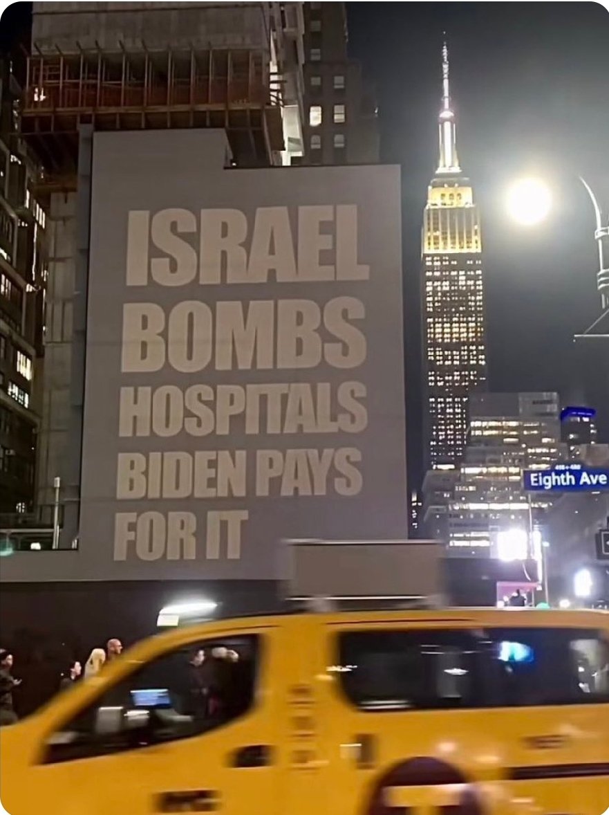 This is NYC, one of the bluest cities in the nation. There are Palestinian solidarity marches daily. There are signs everywhere. Graffiti. And conversations in the street: Israel is committing a genocide and Joe Biden is complicit.