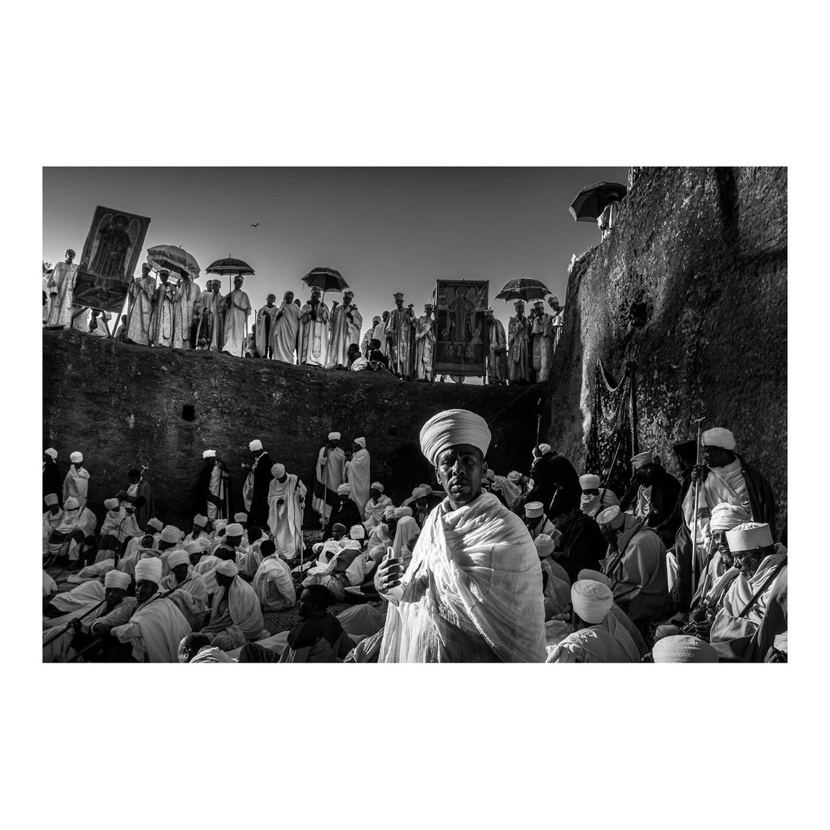 Priests performing impressive Yaredic chants, especially the song entitled by Geez language, “Beza Kulu,” in a manner that symbolizes the praises and songs of angels and men during the Birth of Christ. Christmas is a special occasion here in Ethiopia. #melkamgena