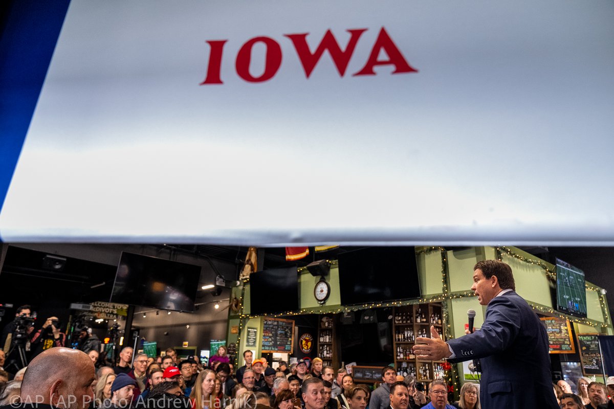 Republican presidential candidate Florida Gov. Ron DeSantis speaks at a rally at McDivot's Indoor Sports Pub in Grimes, Iowa, Sunday, Jan. 7, 2024. (@AP Photo/@andyharnik)