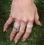 🚨| Taylor Swift simultaneously teases “reputation (Taylor’s Version)”, “Taylor Swift (Taylor’s Version)” and TS11 at the 2024 #GoldenGlobes as she stuns in a green dress wearing a snake ring and earrings with 13 or 11 diamonds on each strand!