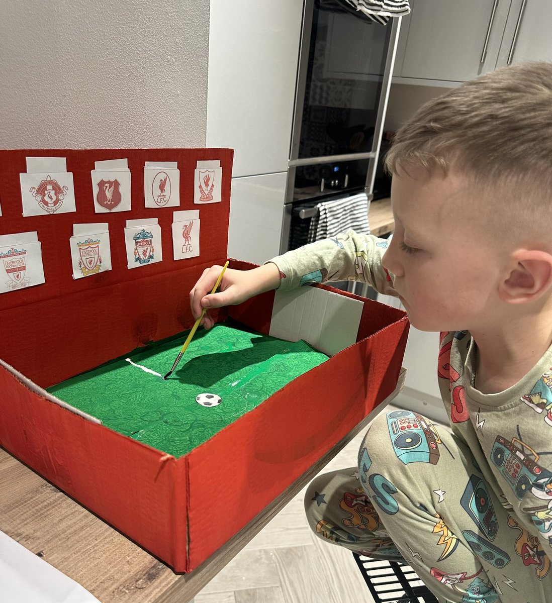 SarahRu17825972's tweet photo. I’ve never seen him so eager to get involved with a task for school… 100 Years of the LFC crest. #LFC #LiverpoolFC @year3ijs @MrGarley https://t.co/Dn8UtIyicq