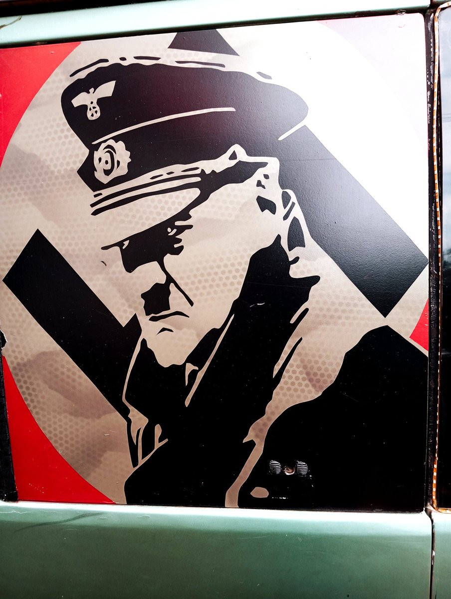 Arnimal2000's tweet photo. Westlands...Is wildin'! This, is a matatu emblazoned with the 'Fuehrer's' visage, complete with swastikas...As I was taking the pics, the crew had already been arrested by law enforcement and traffic cops, your guess is as good as mine as to why they were busted! https://t.co/hjrBgMn2Tj