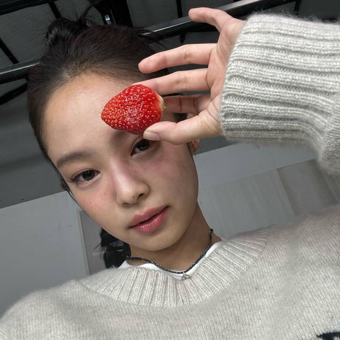 In the collection of almost-forgotten selfies, there’s a charming narrative woven around the unseen bits of moments where strawberries and self-expression intertwine.