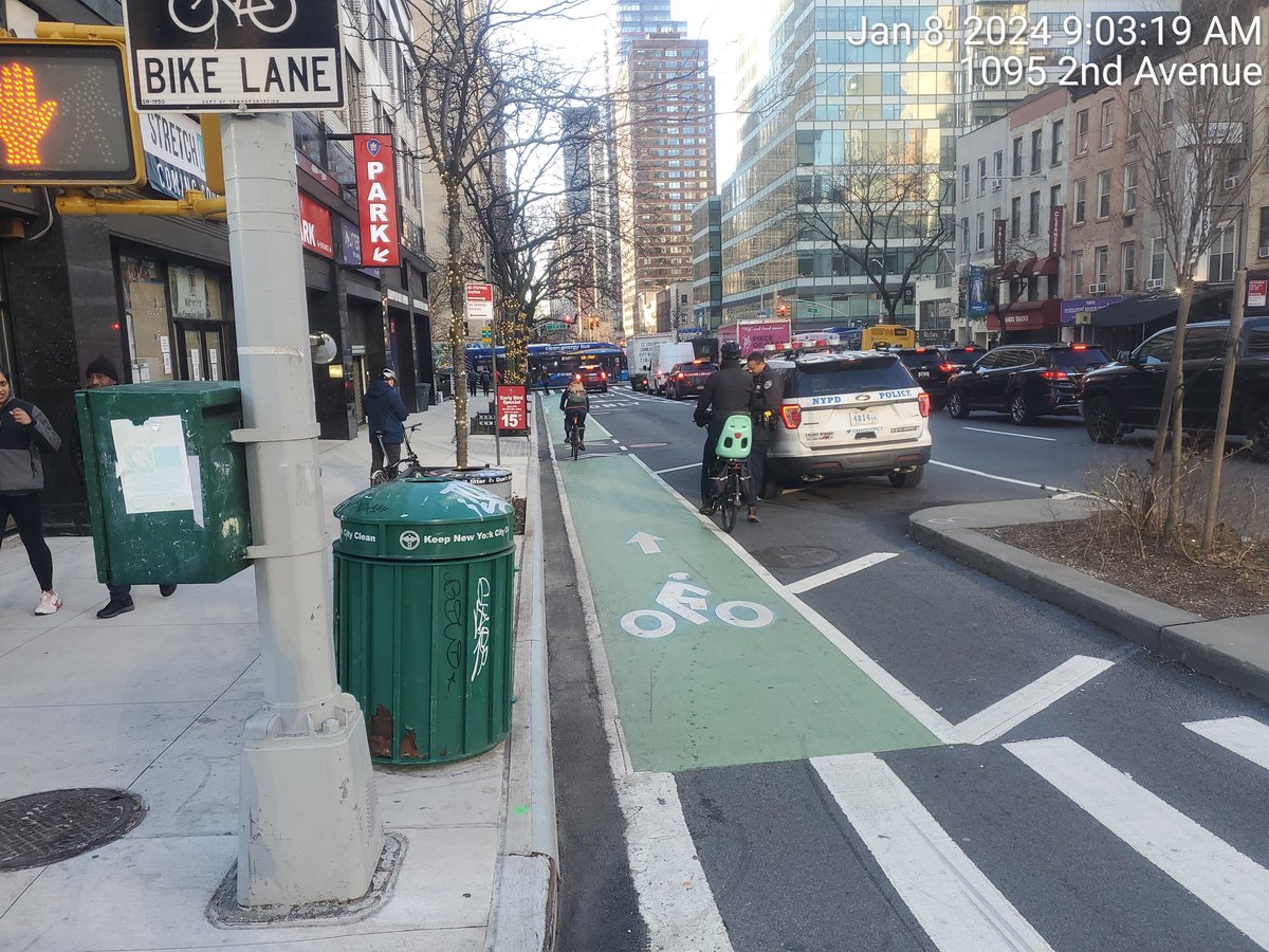 Reasmus2's tweet photo. #bikeNYC alert! Red light ticket trap in progress at 2nd Ave and 58th street. https://t.co/Ab6yqRIHVX