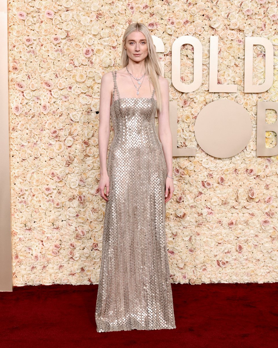 Dior's tweet photo. Delicately subtle.
At the @GoldenGlobes, House ambassador Elizabeth Debicki, draped in a silver tulle look, and actress Rosamund Pike, in a black gown with floral detailing, both showcased #DiorCouture by Maria Grazia Chiuri, exemplifying #DiorSavoirFaire with effortless grace.
#StarsinDior