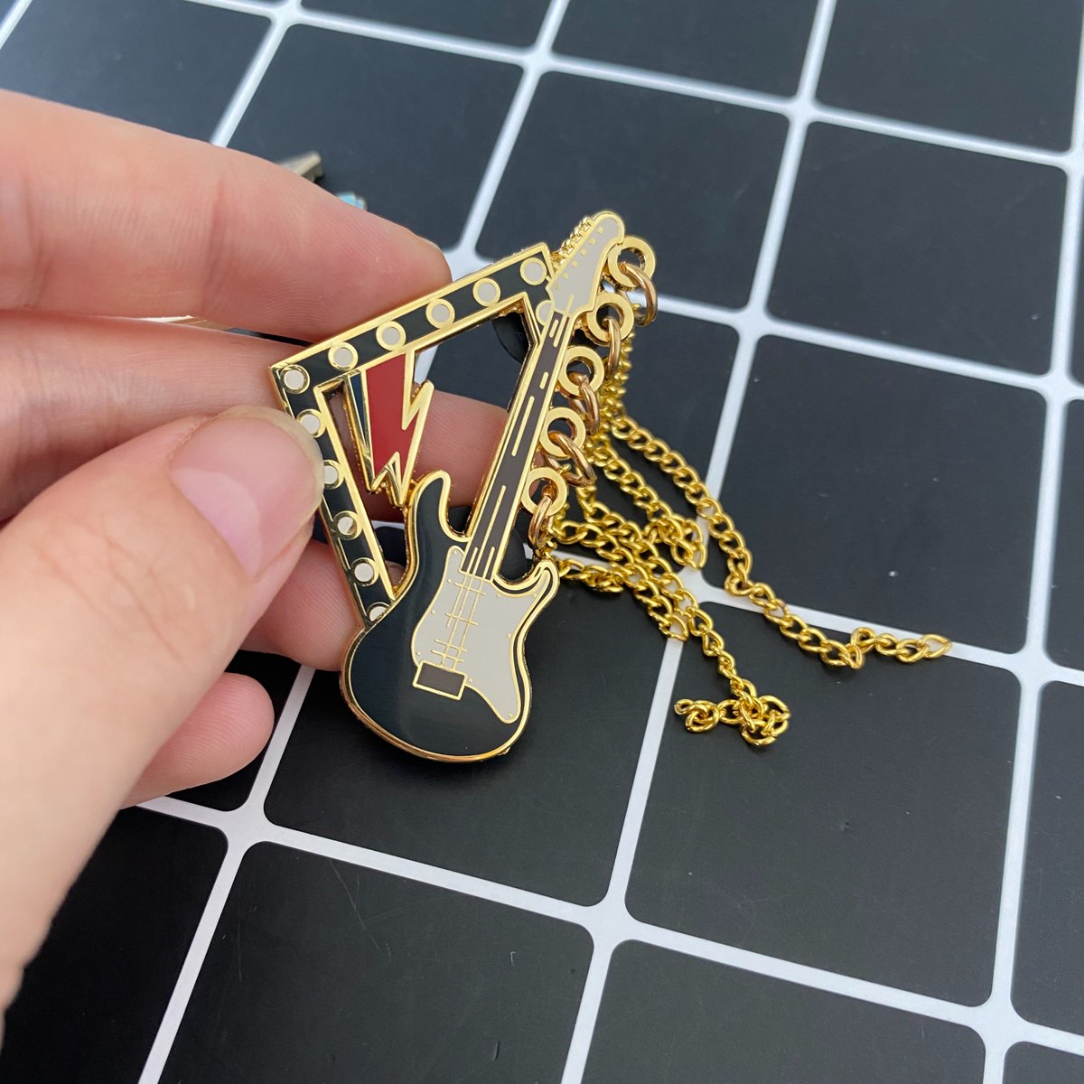 High quality Guitar design
Gold-plated hard enamel pin.
With some short gold chains
1. Low MOQ
2. High quality
3. Reasonable price
4. Free artwork
5. Fast delivery
Waiting for your prompt reply.
#enamelpin #enamelpincollection  #lapelpinstyle #lapelpins #pincustom #pinfactory