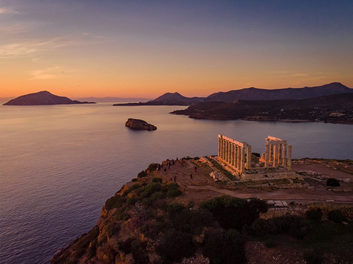 VisitGreecegr's tweet photo. Drink in the lovely sunset view – in one of Attica’s best locations – having the ancient temple as a backdrop and facing the deep blue sea! #VisitGreece #GreekWinter #ttot https://t.co/Alx5bxGV3D