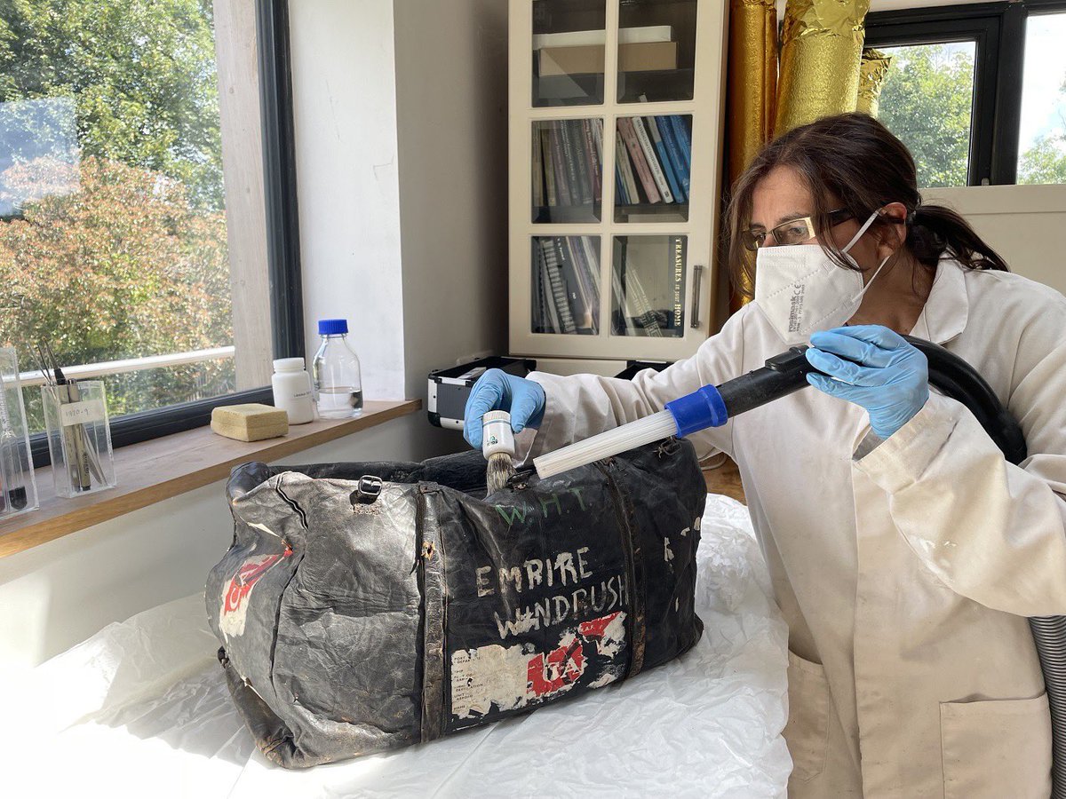 CConserveCymru's tweet photo. Our latest community #conservation project was to clean the dirt and mould from this leather hold-all marked ‘SS Empire Windrush’, once owned by an RAF Warrant Officer stationed at Pembroke Dock. The object will hopefully be displayed by @PDHeritageCent soon 
#windrush https://t.co/FnBOVccXXh
