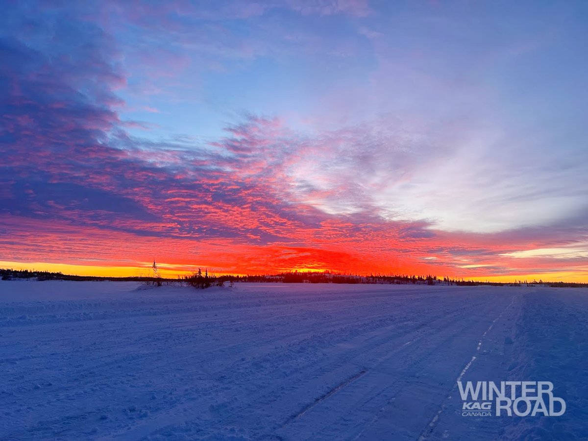 A vibrant sunrise 🌅 over Gordon Lake on the #WorldFamousWinterRoad in the Northwest Territories.