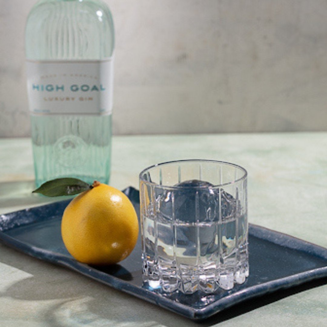 Start the new year off with something crisp and simple...like #HighGoalGin and a spritz of lemon🍋