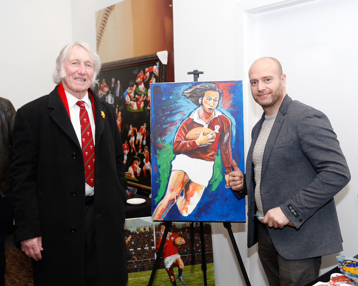 paulfearsphoto's tweet photo. JPR Williams. A rugby legend. Had the fortune to photograph the great man on numerous occasions including this Legends Hospitality event before a Wales England 6 nations game. JPR with artist Patrick Killian
#JPRWilliams #RIPJPR #Rugby
https://t.co/RCg78gAyY3 https://t.co/NOiHUj3adf