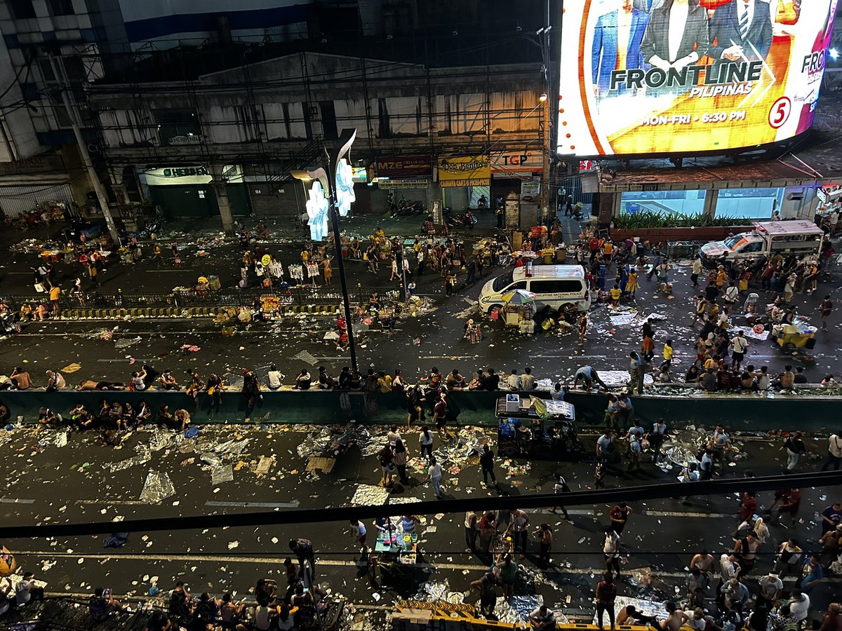 inquirerdotnet's tweet photo. LOOK: Trash covered Quezon Blvd. over an hour after the Black Nazarene returned at Quiapo Church. 

This, despite pleas from environmental groups and church officials to keep the Traslacion garbage-free. #Traslacion2024 #NazarenoINQ | @ZeusLegaspiINQ 

• For more #Nazareno2024 stories, visit https://t.co/NRWhvnyV44.