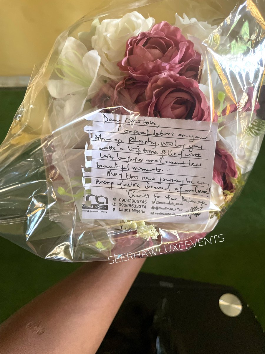 See our beautiful bride from yesterday. 🥵 She wanted a cream and lilac faux petite flowers for her registry and trust us to deliver!!! 👰🏾‍♀️May Almighty God bless your Union , Dr Omotoke. @EdunOmotoke 🙏🏾🎉🤍 Registry Bouquet: @Seerhawluxeevents Peep the beautiful note too.