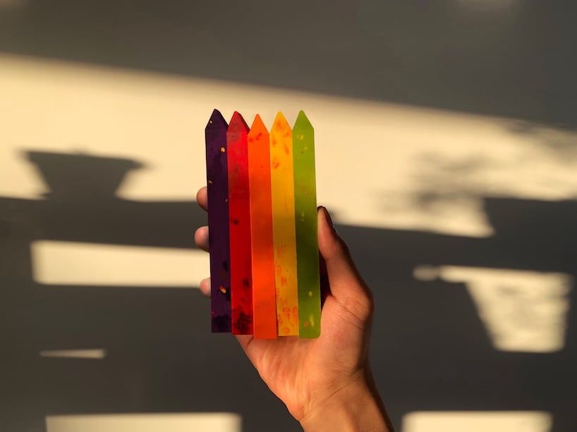 designboom's tweet photo. capturing transient shades of leaves, shion ito's crayons fuse multiple hues into one https://t.co/BeaeZTCk1s https://t.co/0Ua91o5xhQ