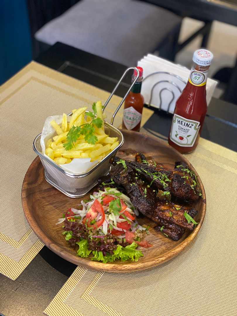 @BadBlack256 At LaBBQ eatery Grab a burger , Tacos, pizza, quesadilla or pork ribs all served with chips or plantain .....For the love of food.