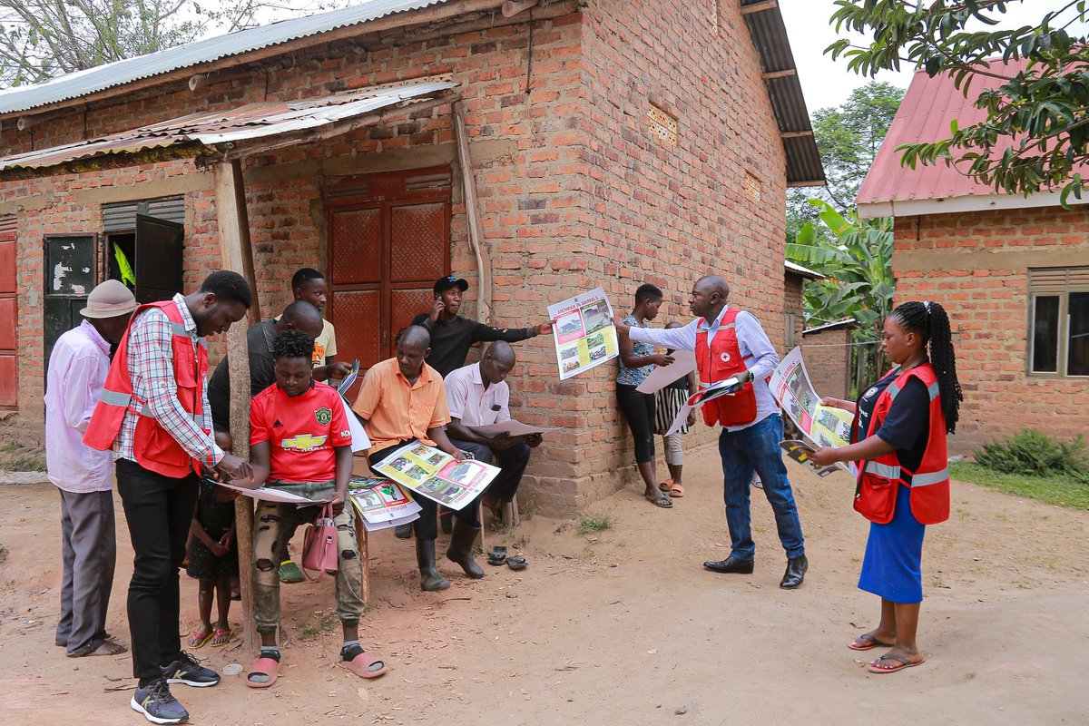 UgandaRedCross's tweet photo. Information, Education & Communication (IEC) materials, translated to local language, with messages on facts about the anthrax disease are shared with people in rural Kyotera, where the anthrax disease has claimed lives of some humans & animals.

The strategy employed by our volunteers aims to create awareness and disseminate information regarding the outbreak and how people can keep safe, together with their animals.

Efforts funded by @IFRC_DREF @ifrc @IFRCAfrica 

#AnthraxResponseUg 

@MAAIF_Uganda @MinofHealthUG @GovUganda