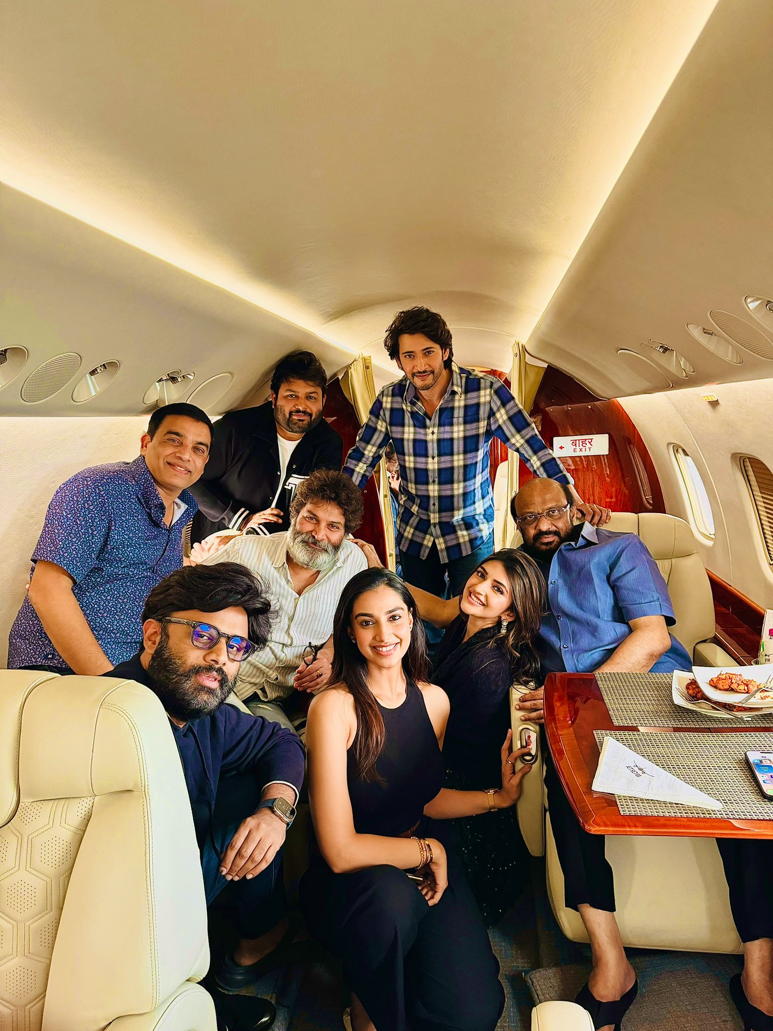 Guntur Kaaram movie unit for pre-release event in Guntur on special flight