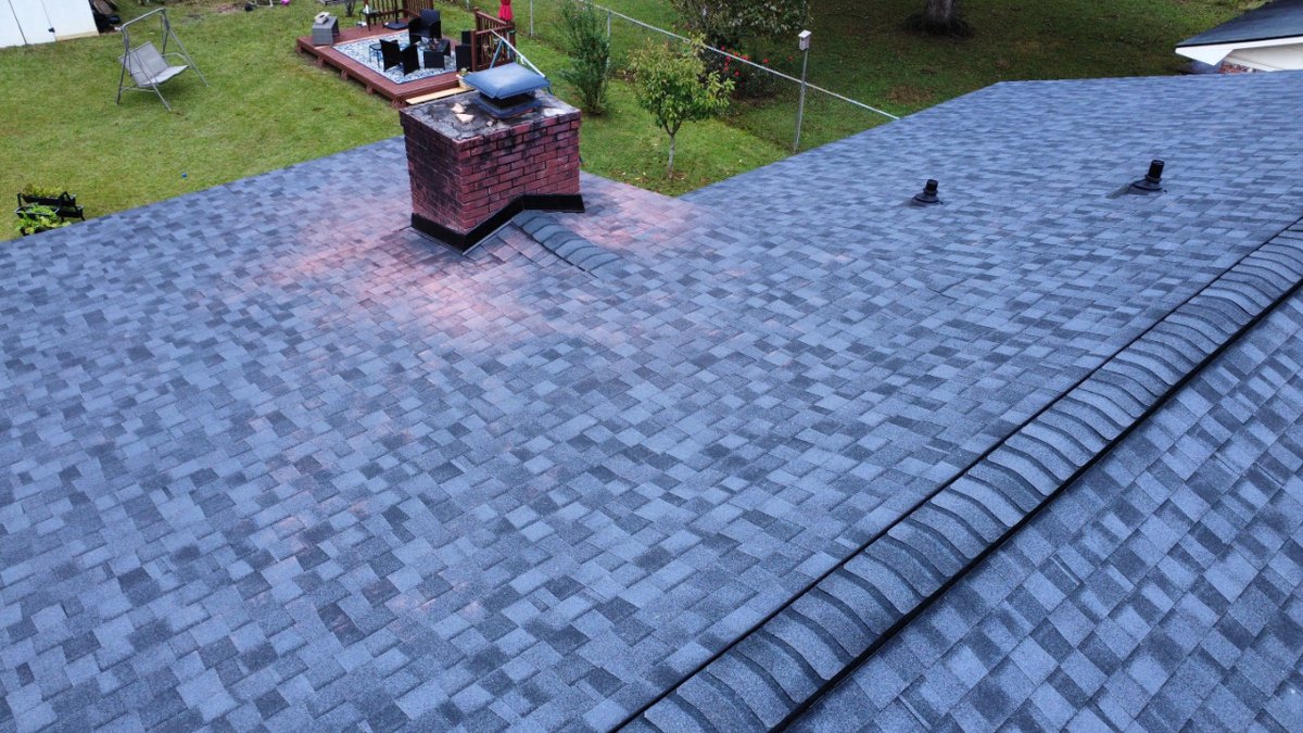 TheRedShirtGuys's tweet photo. Can you see the red powder on the shingles next to the chimney? That means our craftsmen cut into the brick chimney to install the metal flashing correctly, making it watertight for years to come. If you see this on your roof, don’t worry – the first rain will wash it away! https://t.co/SP7cWU1HHv