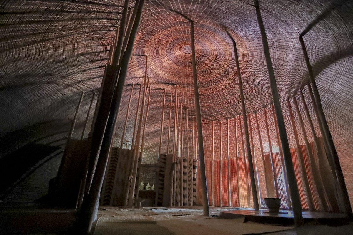 Majestic. The King's Palace at Nyanza, Rwanda was a temporary structure by nature because it was constructed of woven grass. But this faithful reconstruction on its site captures the builders' impressive artistry. The fragrance of the grass perfumed the tall domed structure.