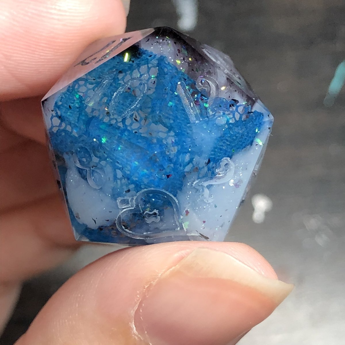 HealersHug's tweet photo. .This set came out beautifully, only one little bubble in the d6 that can be patched easily. I absolutely love how the blue green lace looks in this set. 

#handmadedice #dice #diceset #dnd #dungeonsanddragons #ttrpg #dicemaking #dicegoblin #dicemaker https://t.co/KlVujEkMow