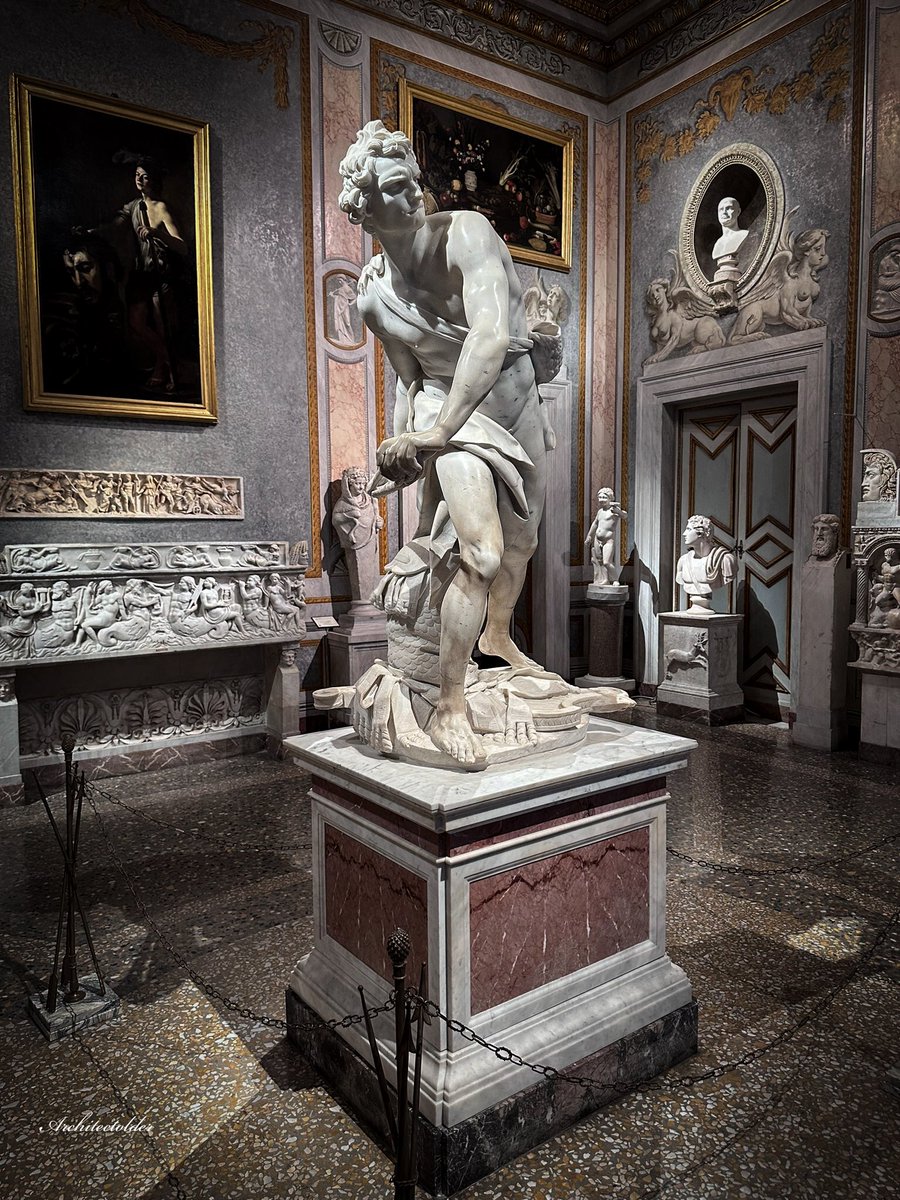 Notice the right foot of Bernini’s David. It’s separated from the base. The left foot has the heel raised from the back of the base. Bernini intended the viewer to perceive motion. David is stepping off the pedestal to attack Goliath, but he froze the movement for the viewer.