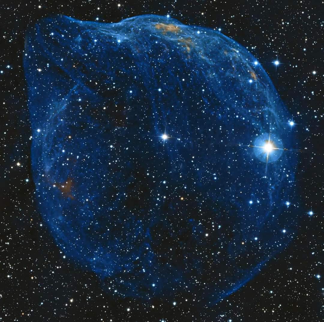 Sh2-308 is a faint emission nebula located in the constellation Canis Major. This intricate celestial object is often referred to as the 'Gum Nebula' or 'RCW 36.' The nebula is named after the Australian astronomer Colin Stanley Gum, who cataloged it as part of his study of