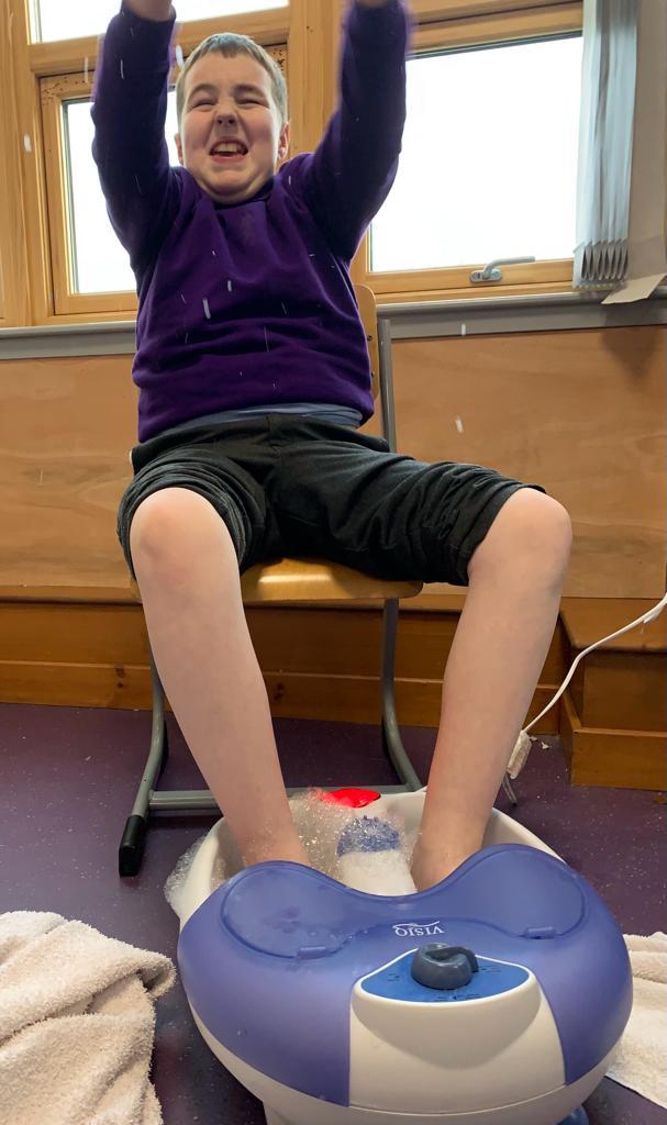 SeafieldHT's tweet photo. Ahhhh 🤗 It's lovely to get back into our school routine 💜 The boys have had a therapeutic afternoon #learninglounge 💧💧#sensory 🧑‍🎨 Our foot spa is always a favourite 🦵🦵 https://t.co/ccfcHcrQCO