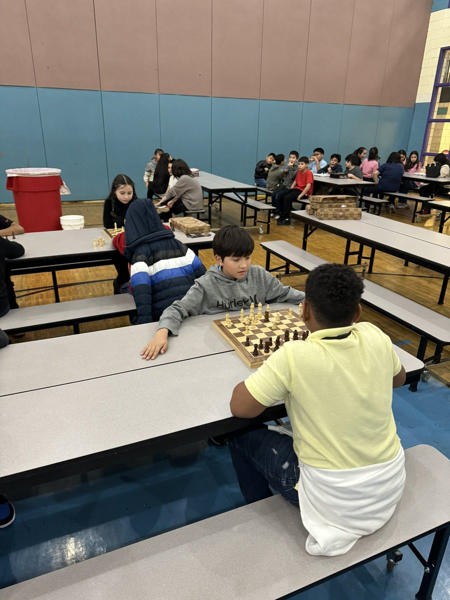 Young Scholars playing chess during recess time!!