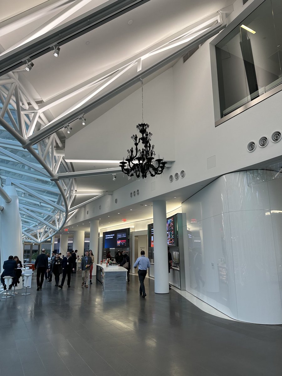 Can someone explain to me what a black traditional chandelier is doing in the middle of the stark white modernist 6th floor at Bloomberg?