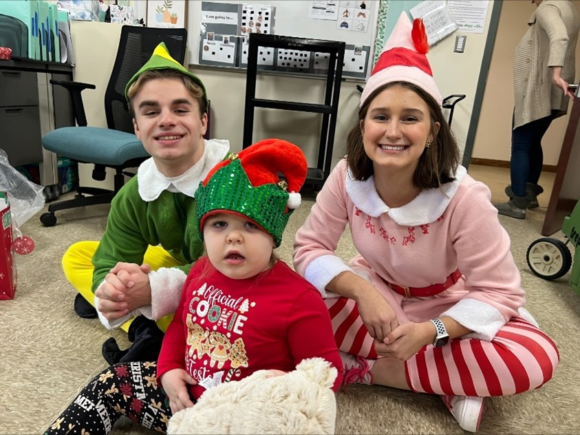 Saranac Senior Cayden Bouvia, dressed as Buddy the Elf, delivered presents to Rise students with his helper Madelyn Willette, dressed as Jovi the Elf. The two brought plenty of joy and smiles to our Rise Community as part of Cayden's legacy project for National Honors Society.