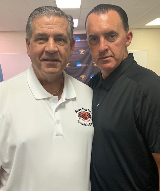 If you see this guy, Steve Gordon, in your gym say hello to him. Steve officiated in the ACC and Division I for 26+ years and gives back today by evaluating officials and has a summer camp to help develop officials. (pictured with current ACC Official, Roger Ayers)