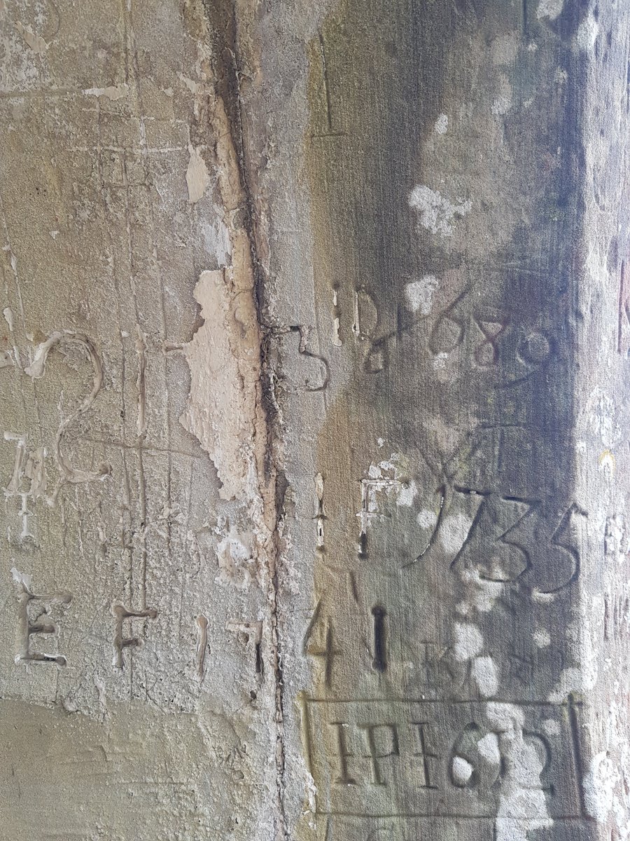 TheHistoryMouse's tweet photo. Initials and dates spanning C17 to C19 smother this door surround. #HistoricGraffiti mingles with modern graffiti #BaverstockChurch #ImJustStaringAtWalls #GraffitiTuesday https://t.co/PWlOtbPlcS