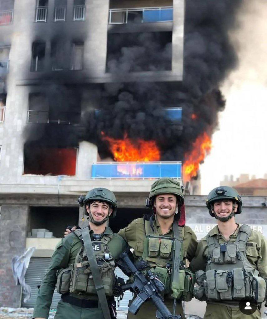 Trimiy's tweet photo. @Israel Posting next to a burning school after explode it an then you say International Law? 🤮 https://t.co/32ydtCGeEd