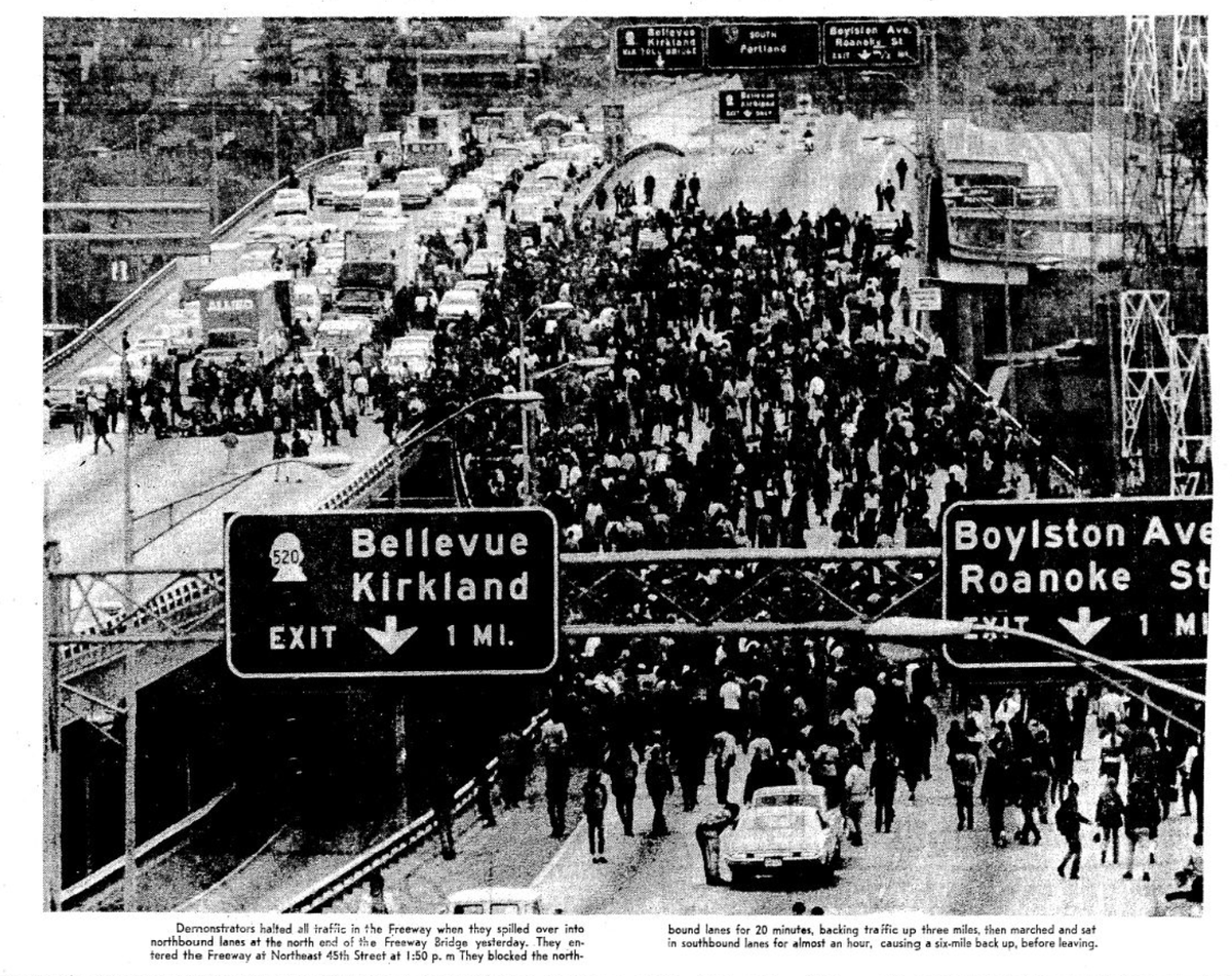 eyesonthestorm's tweet photo. Seattle, May 1970: Several thousand antiwar protesters march from the University of Washington to Eastlake, occupy Interstate 5, and block traffic in both directions for 80 minutes. Demonstrators opposed the escalation of the US military's campaign in Cambodia into Vietnam. (1/2) https://t.co/FbPNgVVYmz