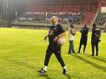 SaddickAdams's tweet photo. According to @soccercafe1,  the Gambia National Team failed to turn up for their open training session at the independent stadium due to unpaid bonuses. 

Coach Tom Saintfiet and his technical team only greeted the crowds as hundreds came to watch the scropion train. Saintfiet is currently addressing the media.

The scene is currently ugly as fans clash with GFF officials, and the PIU is using tear gas to hold back disgruntled fans. #AFCON2023