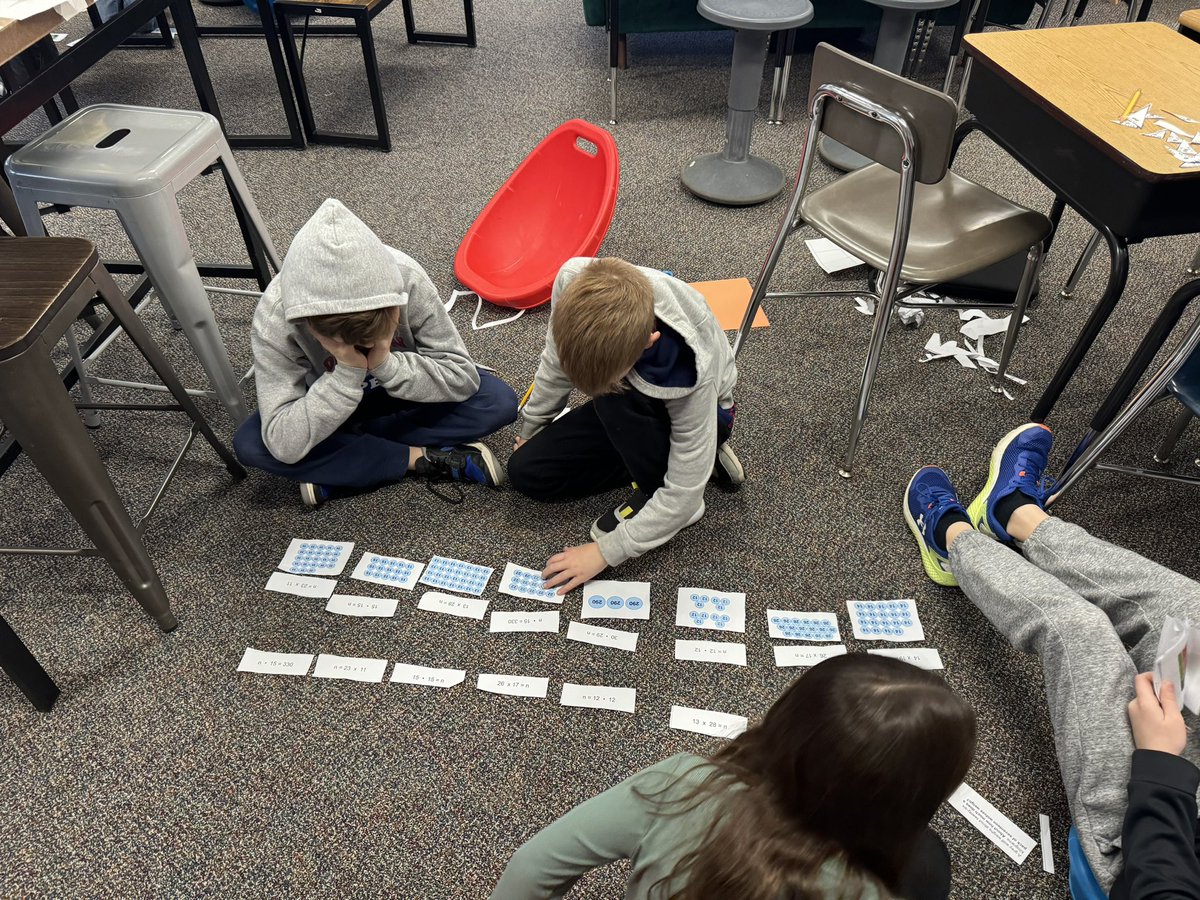 Working with a partner to sort equations, word problems, and area models!